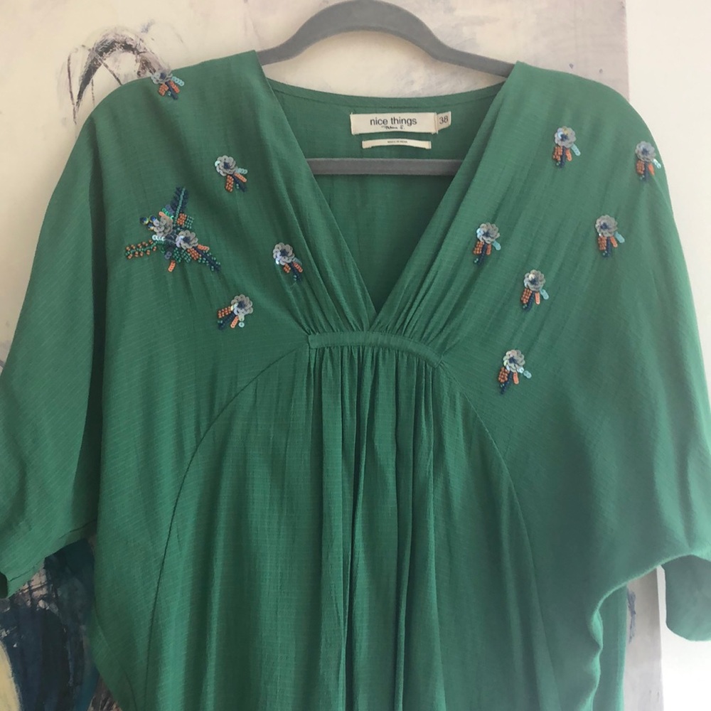 LIKE NEW! Hand beaded top.